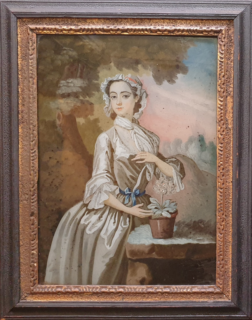 18th.Century Reverse Glass Painting Of A Lady With An Auricula Circa.1745